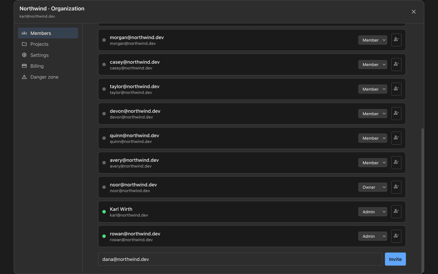 The organization management dialog listing team members with their email addresses and roles, and an invite field at the bottom